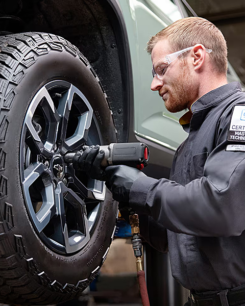Service Technician working on a vehicle