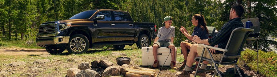 family owning a toyota tundra camping