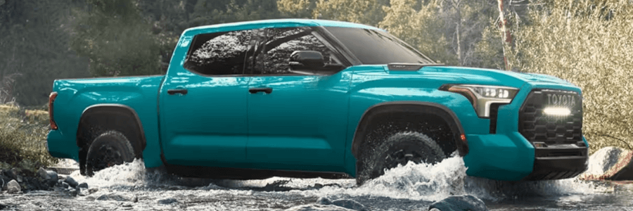 2026 Tundra in turquoise driving through a creek