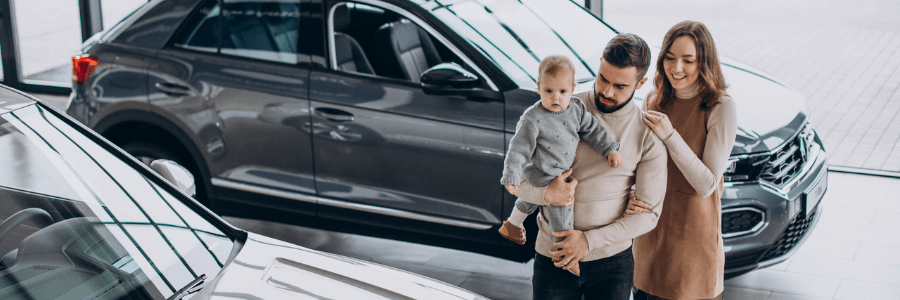 Featured Image family at a car dealership