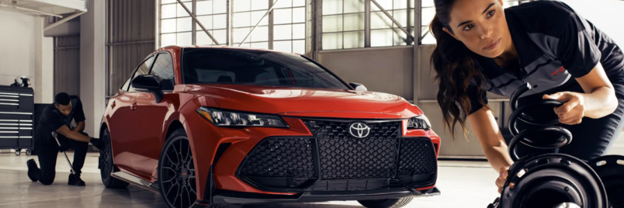 Featured Image Toyota service technicians working on sedan