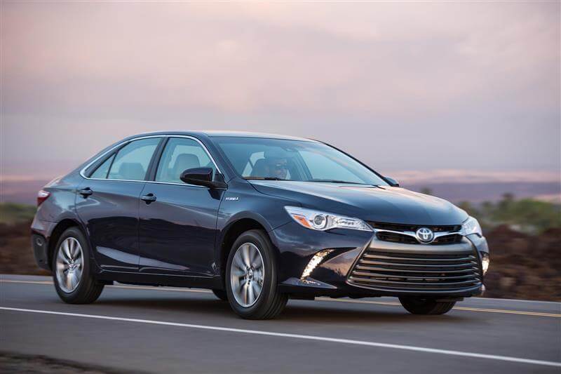 Certified Pre-Owned 2016 Toyota Camry driving down the highway