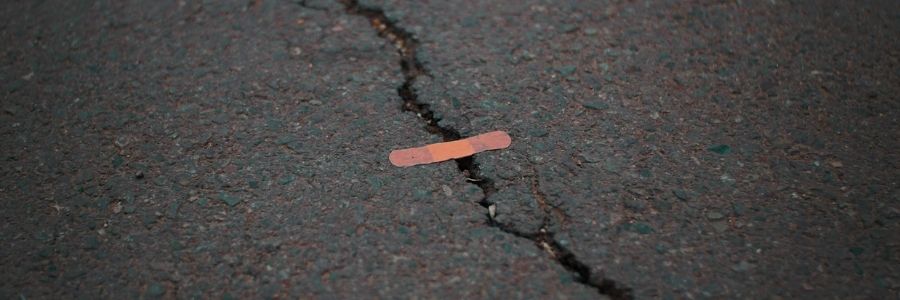 band-aid over a crack in the road