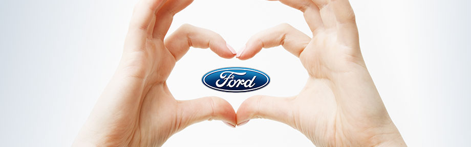 Ford logo inside heart hands