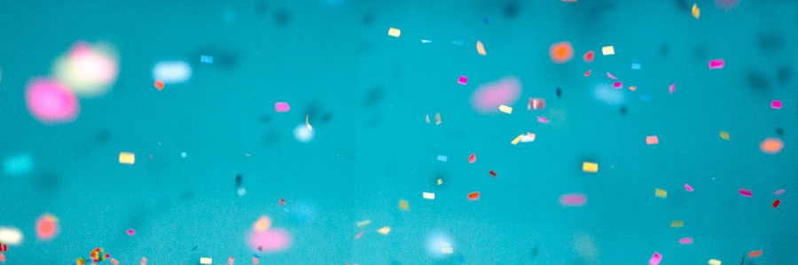 Colourful confetti on a turquoise background