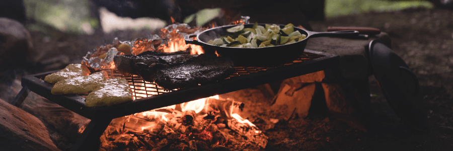 Food cooking over a campfire