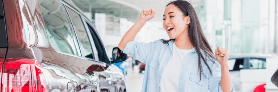 happy customer at car dealership