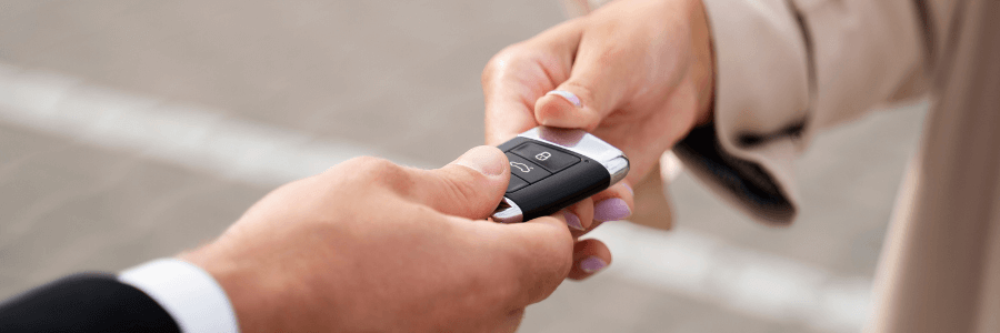 Featured Image customer passing car key