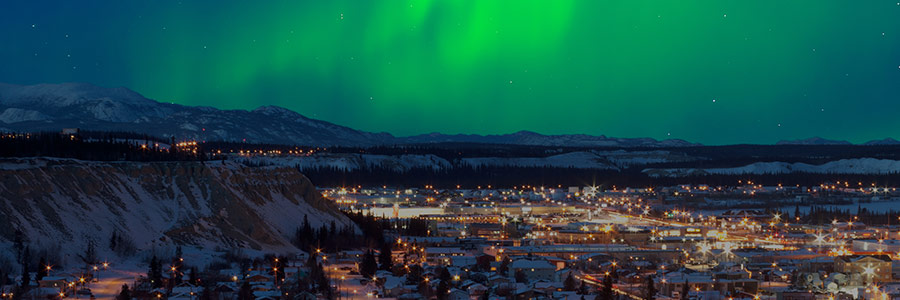 northern lights over downtown whitehorse