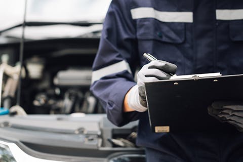 service tech making notes