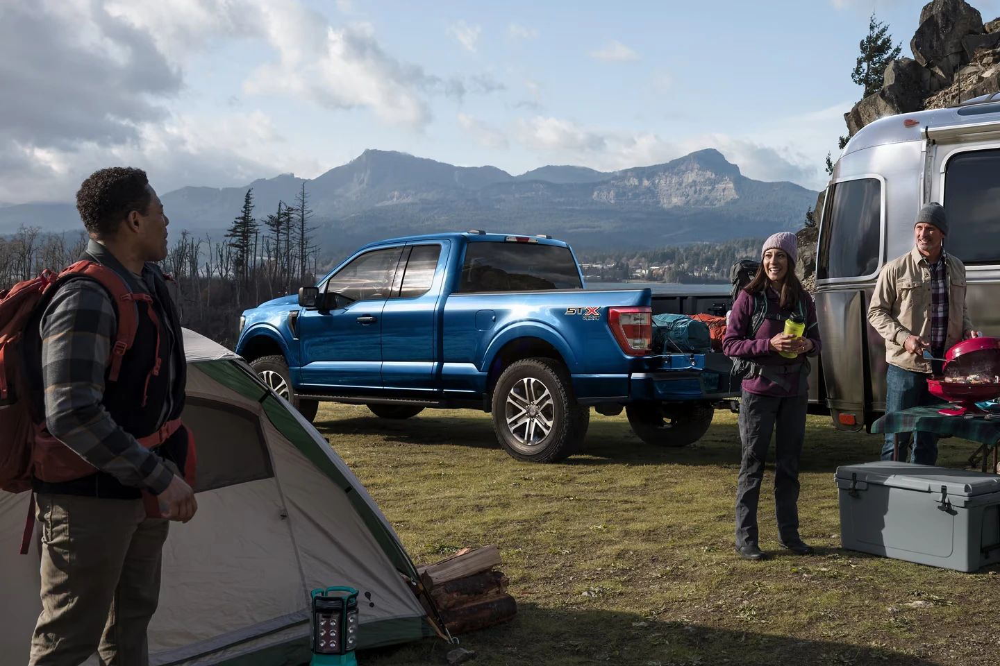 Blue ford truck in open field