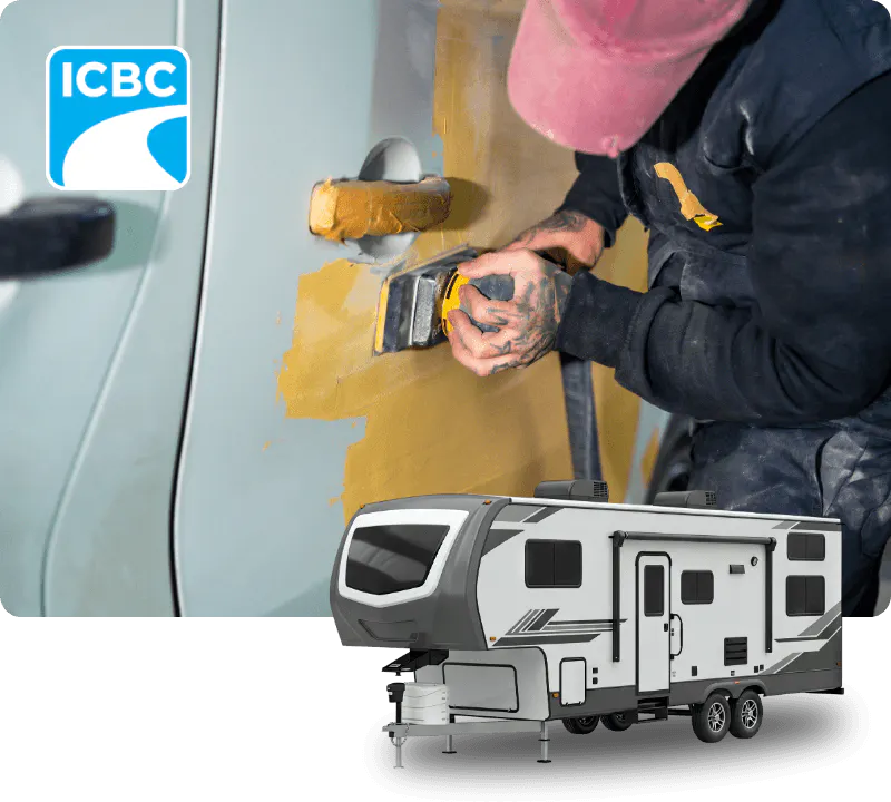Technician sanding RV exterior 