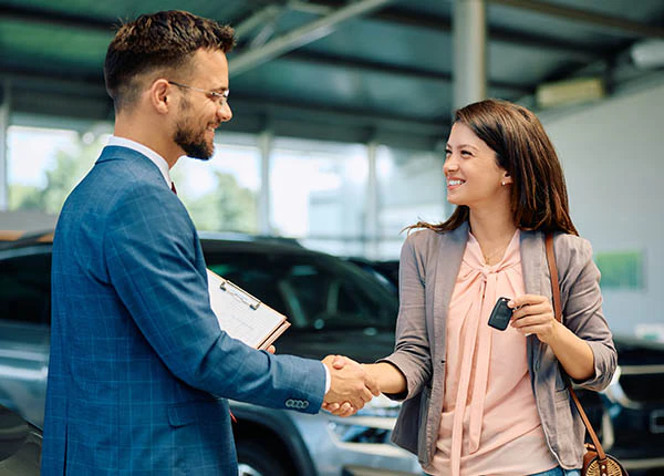 joyous-buyer-communicating-with-automotive-sales