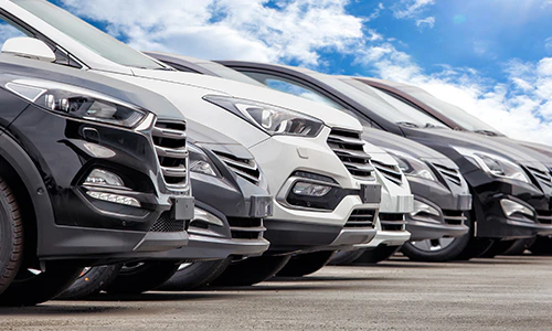 row of vehicles on lot