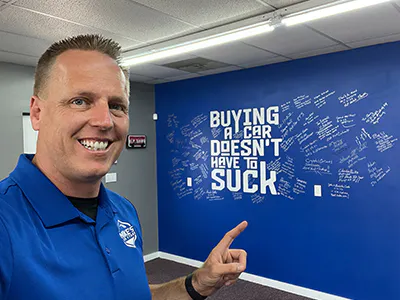 Mike showing off his slogan