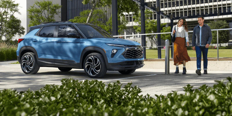 A Subaru SUV car parked on a road side