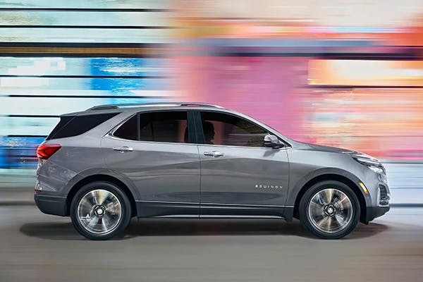 silver Chevrolet SUV profile shot