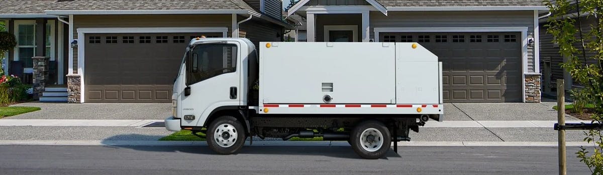 Chevrolet commercial vehicle parked in a residential area