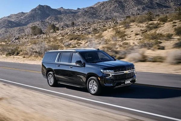 Black Chevrolet SUV on the open road