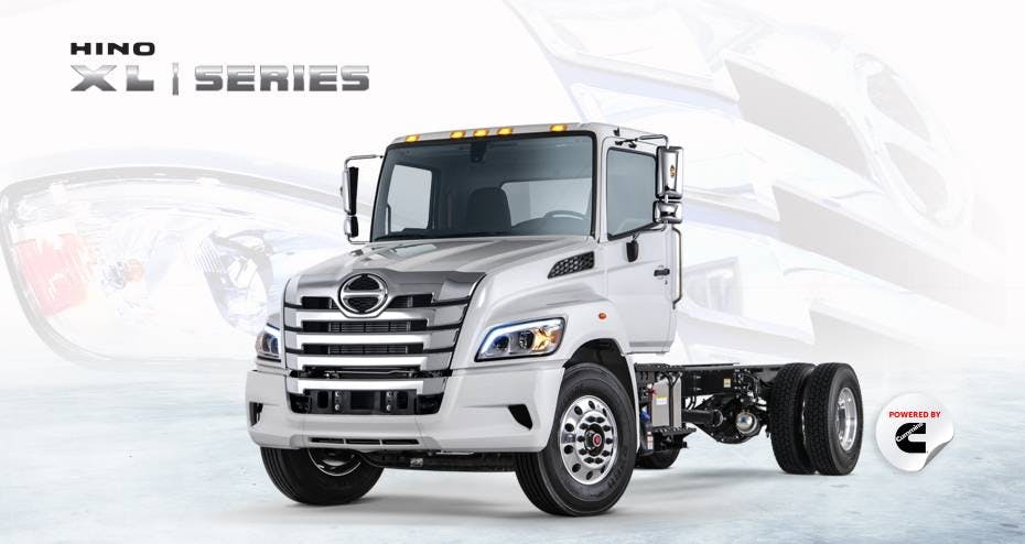 A white Hino XL Series Tandem Axle