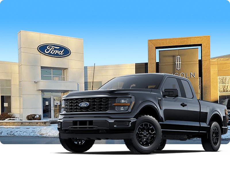 Ford truck placed in front of Ford dealership