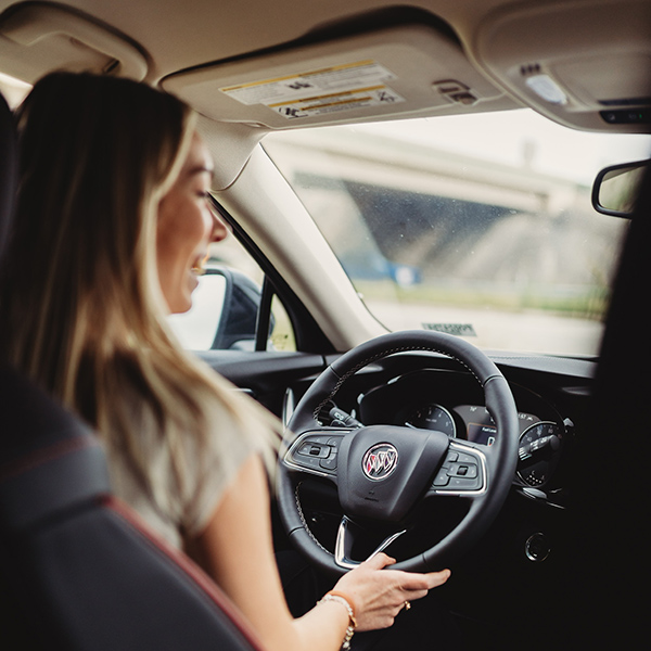Cavender Coverage - Cavender Confidence - woman driving a new car
