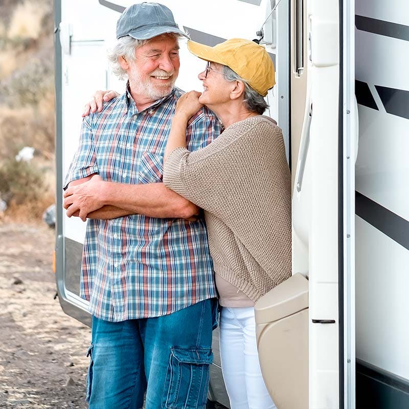happy-adult-couple-and-their-rv