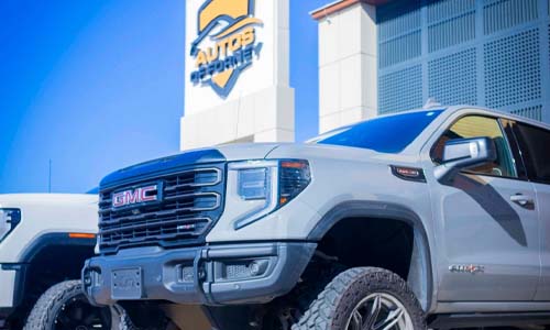 Exterior of Autos of Forney Greenville Used Car Dealership featuring a used GMC Truck