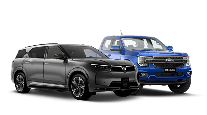 New VinFast VF9 next to a pre-owned Ford Ranger