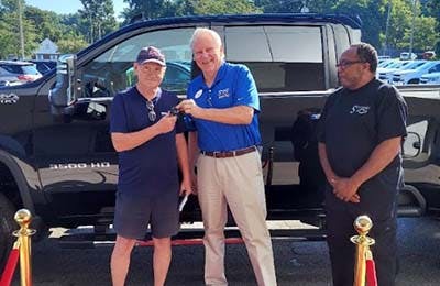 a happy Strosnider dealership customer 