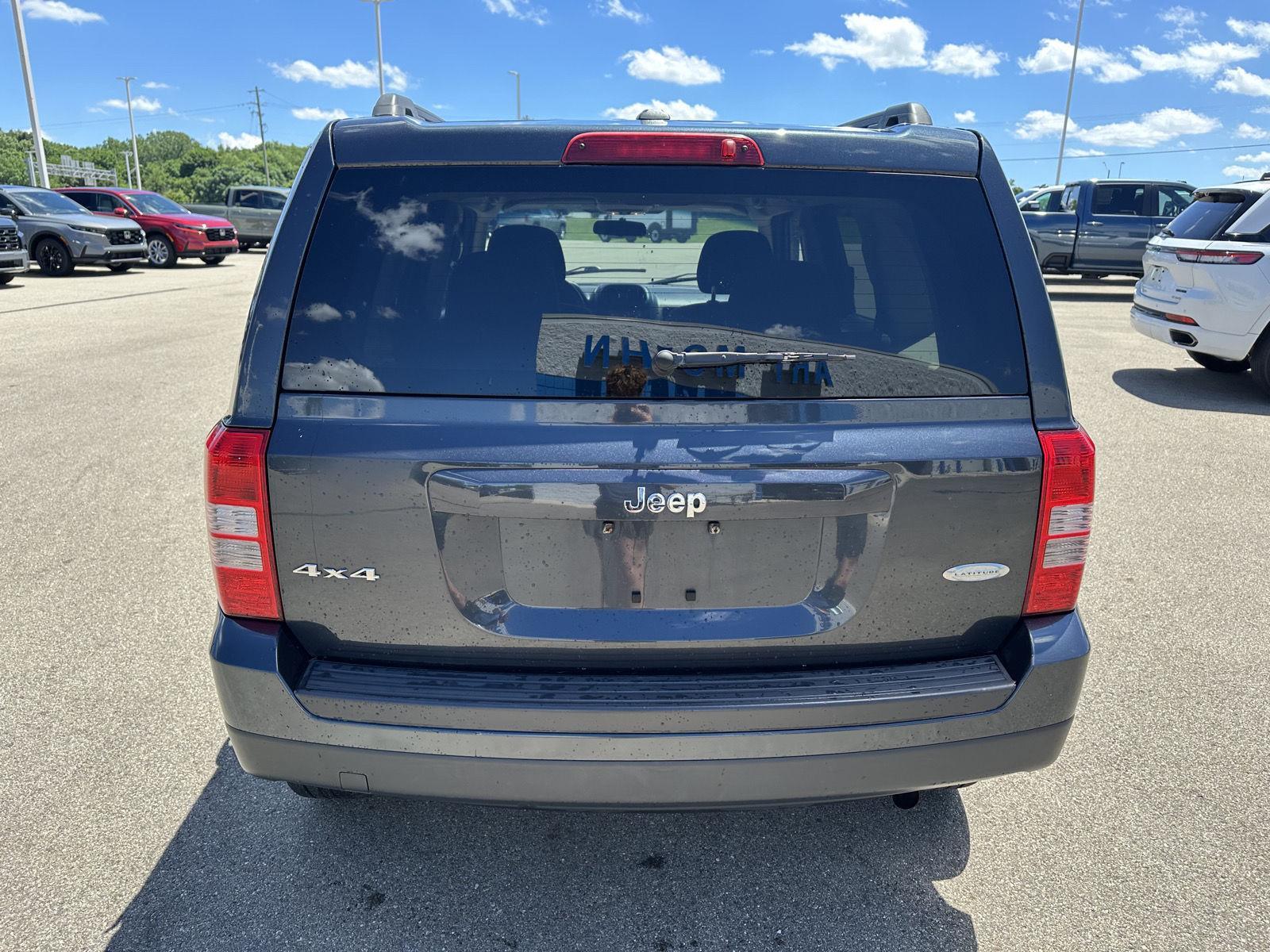 Used 2014 Jeep Patriot Latitude with VIN 1C4NJRFBXED809893 for sale in Jackson, MI