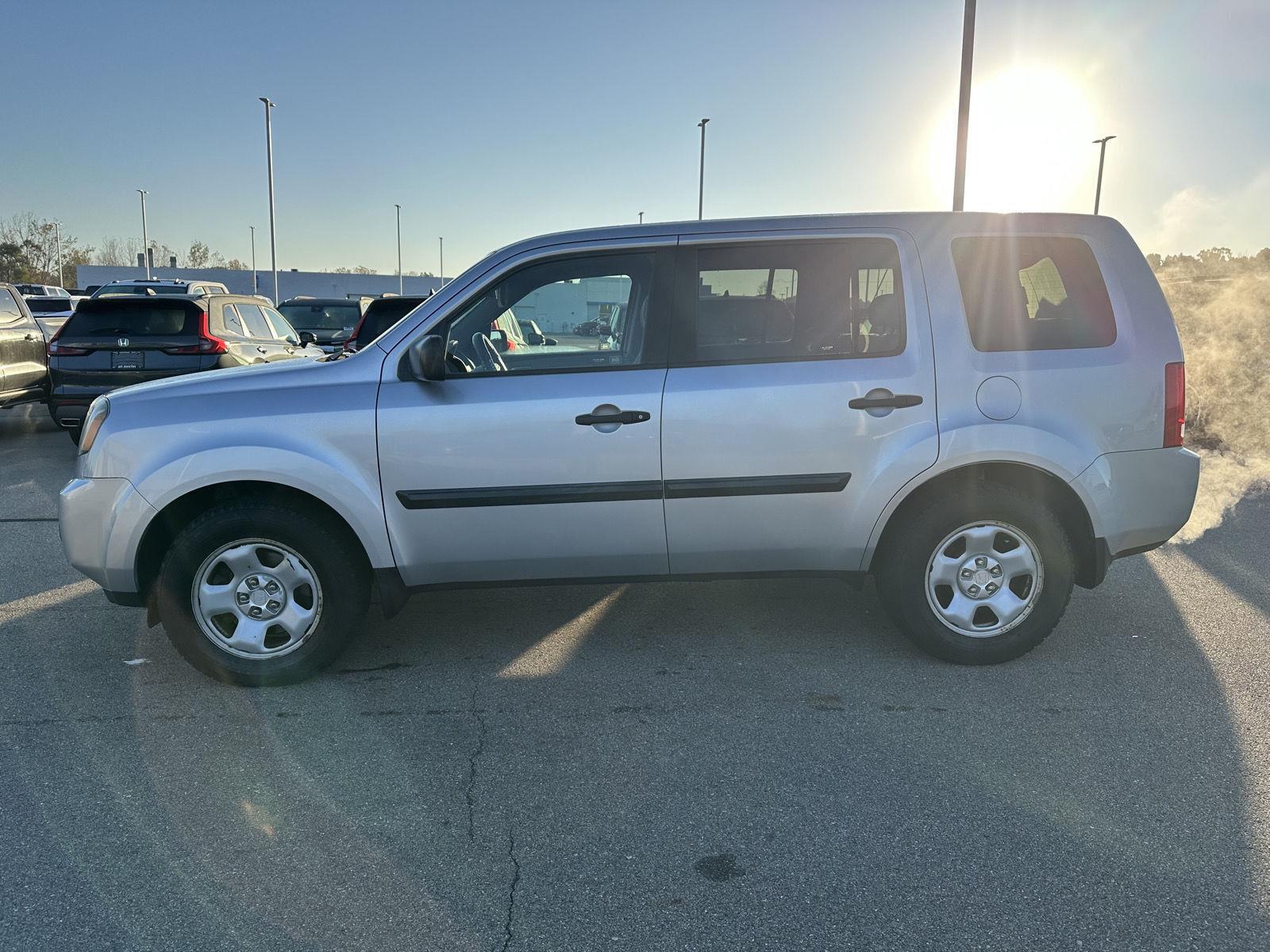 Used 2011 Honda Pilot LX with VIN 5FNYF4H27BB052812 for sale in Jackson, MI