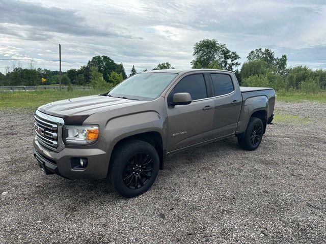 Used 2015 GMC Canyon SLE with VIN 1GTG6BE39F1187009 for sale in Jackson, MI