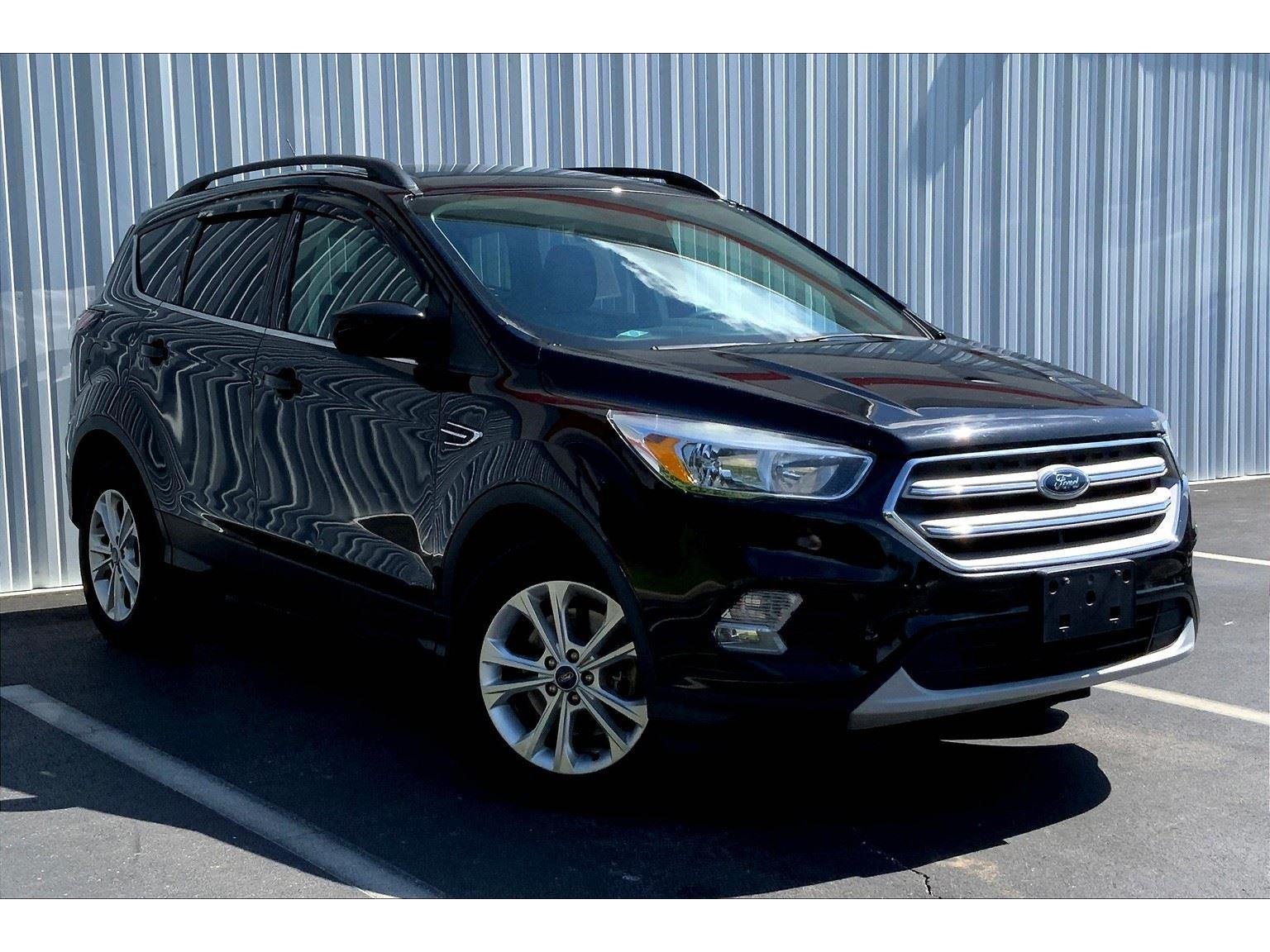 Used 2018 Ford Escape SE with VIN 1FMCU9GD6JUA68663 for sale in Joplin, MO